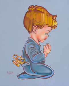 little boy praying, blue background, brass knuckles in back pocket. boy in blue pajamas praying, 